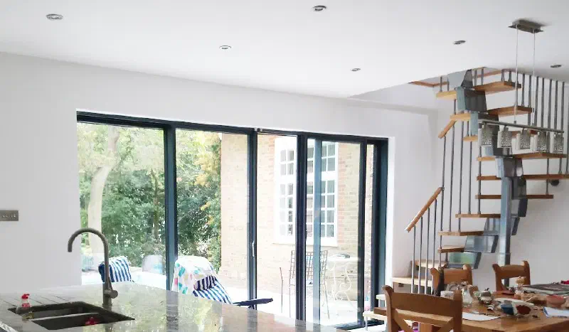 The dining area opening onto the south-east garden patio